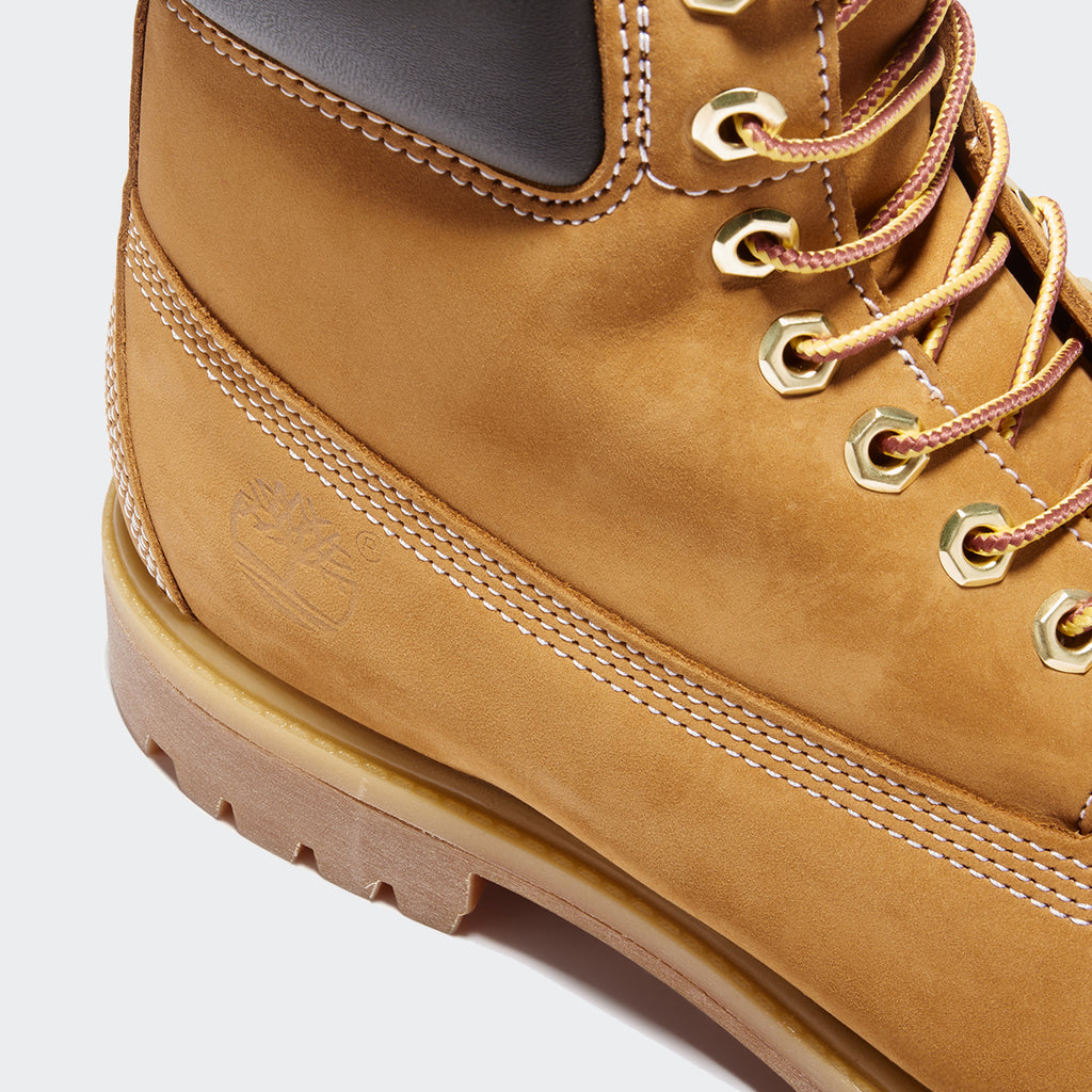 Men's Timberland Icon 6-Inch Premium Waterproof Boots Wheat Nubuck (TB010061713) | Chicago City Sports | close-up view of Timberland logo
