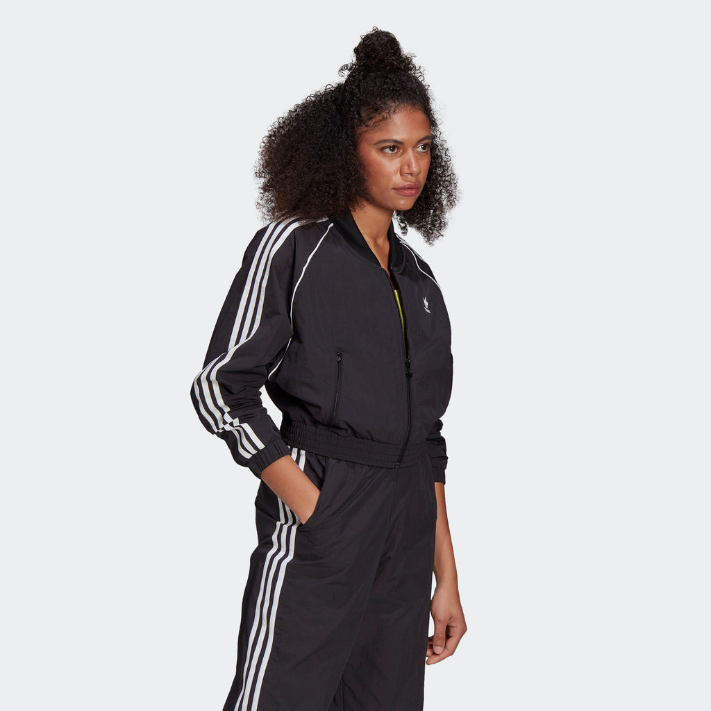 Women's adidas Originals Adicolor Classics Cropped Track Jacket Black GN2791 | Chicago City Sports | angled view on model