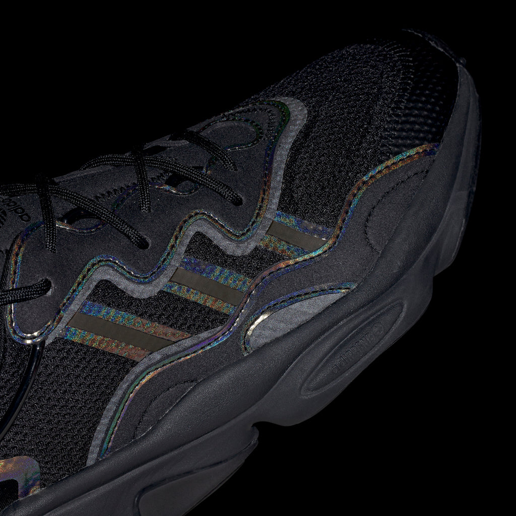 Men's adidas Ozweego Shoes Black SKU FV9653 | Chicago City Sports | detailed toe area view in the dark