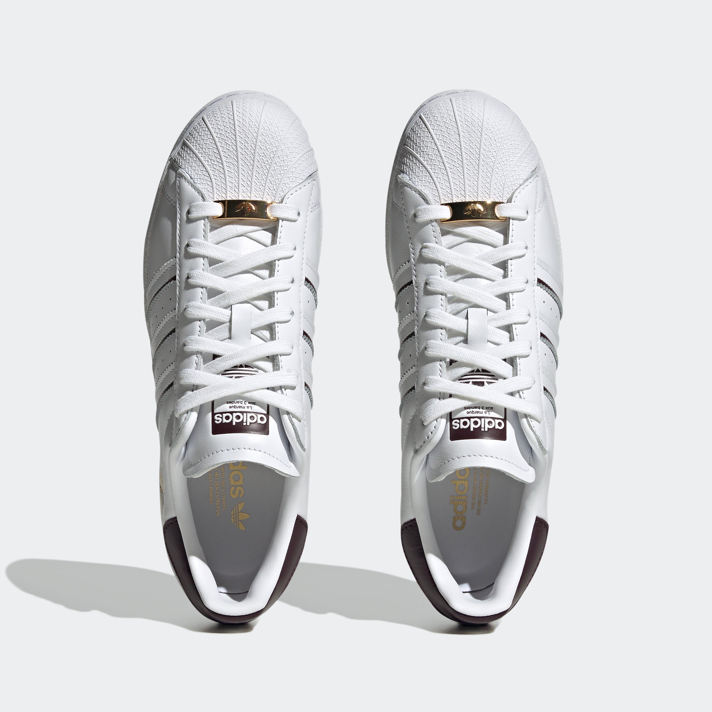 adidas Originals Superstar trainers in white