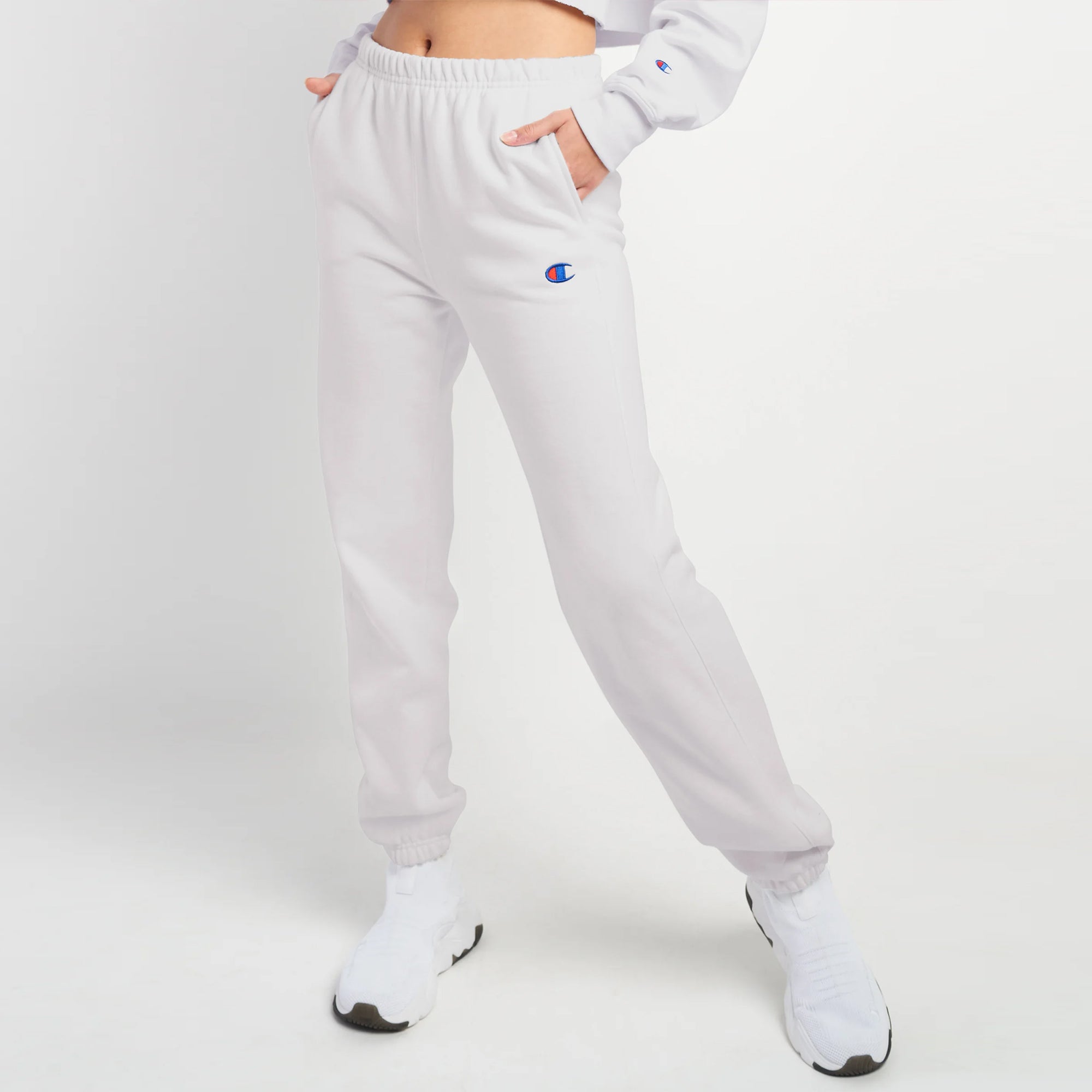https://chicagocitysports.com/cdn/shop/products/Women_s-Champion-Reverse-Weave-Oversized-Sweatpants-White_GF884Y06146045_01.jpg?v=1677273107
