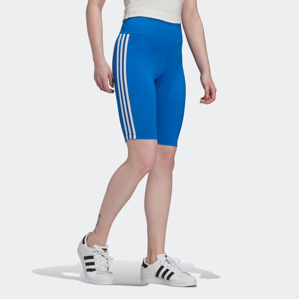 Women's adidas Originals Adicolor 3D Trefoil Biker Shorts Blue GM6765 | Chicago City Sports | angled view on model