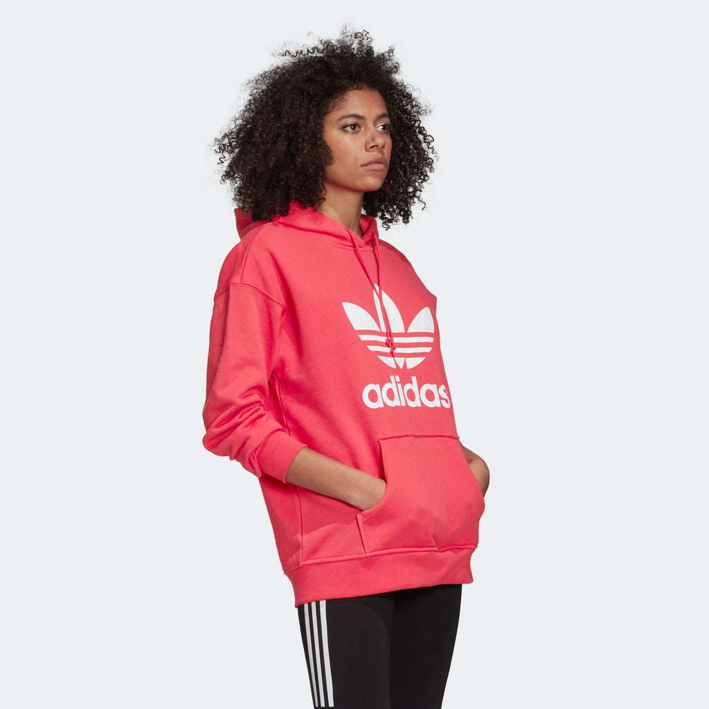 Women's adidas Originals Adicolor Trefoil Hoodie Power Pink GD2439 | Chicago City Sports | angled view on model
