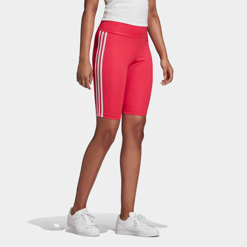 Women's adidas Originals Biker Shorts Power Pink GD2356 | Chicago City Sports | angled view on model