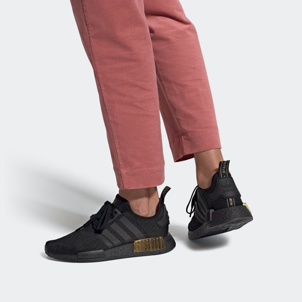 adidas NMD_R1 Shoes Black Gold Metallic FV1787 | Chicago City Sports | on model view