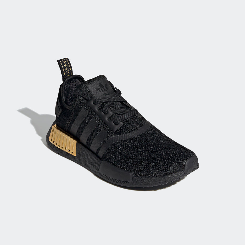 adidas NMD_R1 Shoes Black Gold Metallic FV1787 | Chicago City Sports | angled view