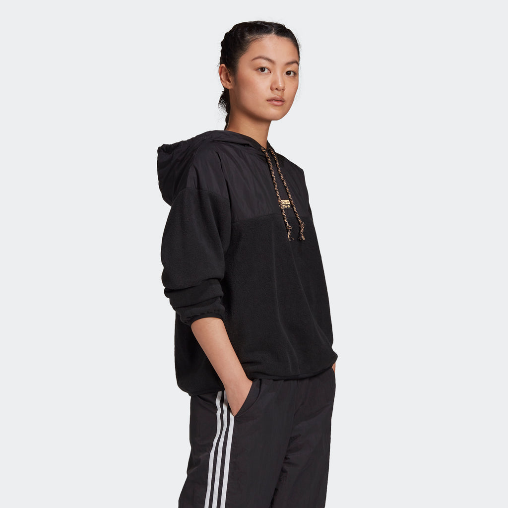 Women's adidas Originals R.Y.V. Hoodie Black GN4250 | Chicago City Sports | angled view on model