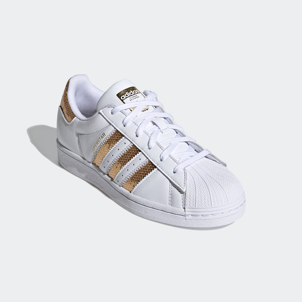 Women's adidas Originals Superstar Shoes White Gold G55658 | Chicago City Sports | angled view